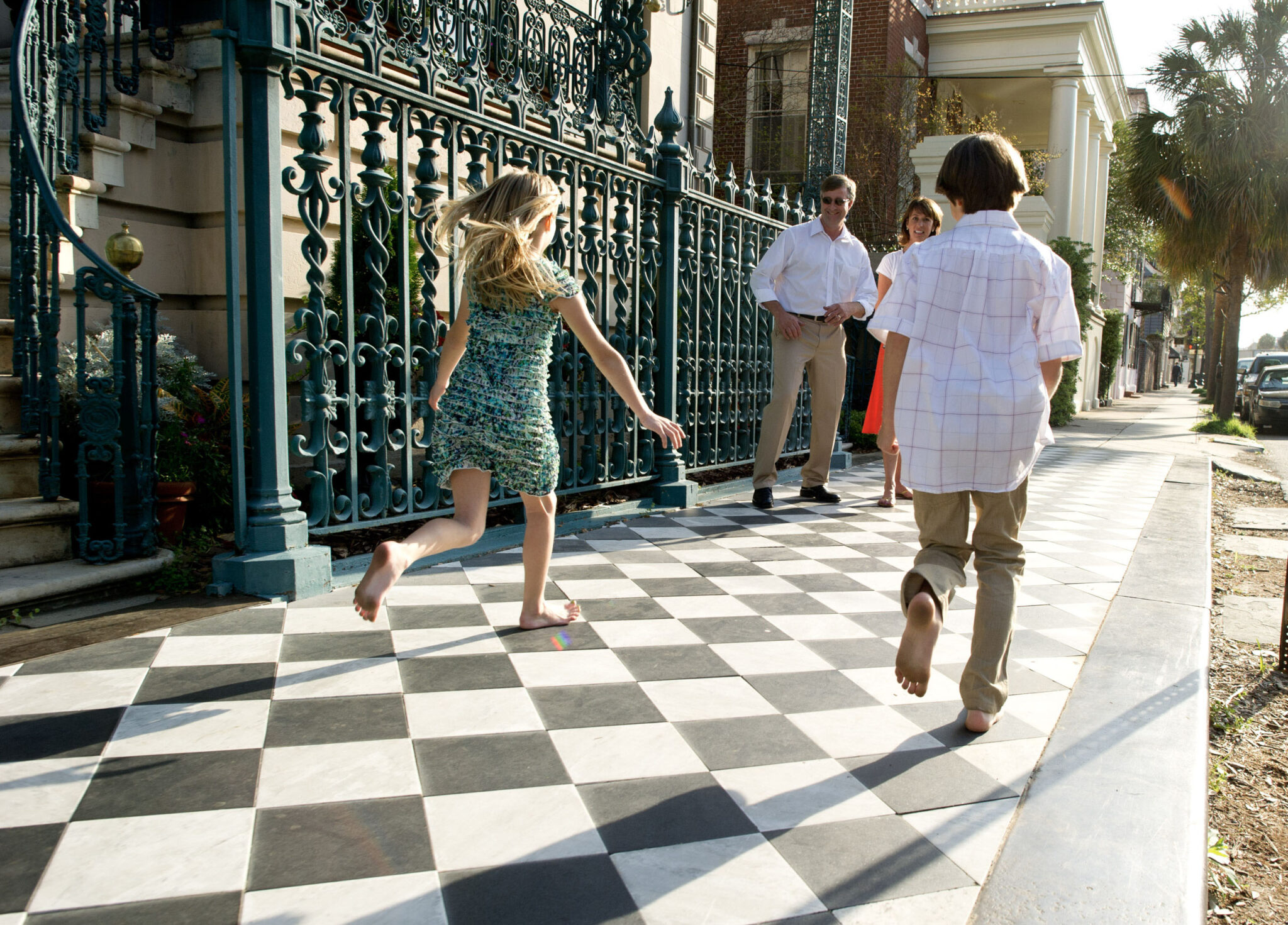 Family playing outside John Rutledge House Inn®