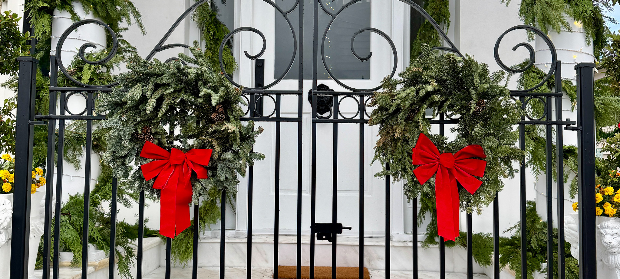 House decorated with Christmas wreathes in downtown Charleston
